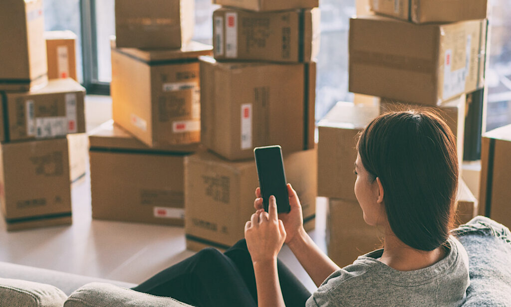 Woman researching where the best Boise Movers near her are currently located