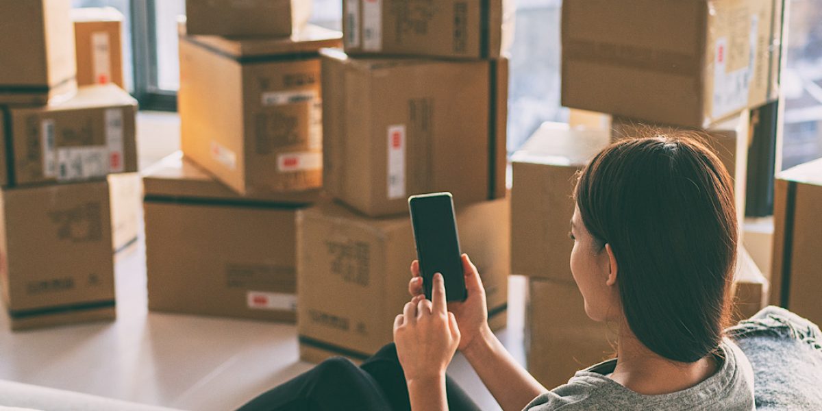 Woman researching where the best Boise Movers near her are currently located